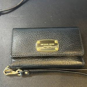 Michael Kors black leather phone wristlet. NWT